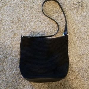 The Sak black purse with leather bottom